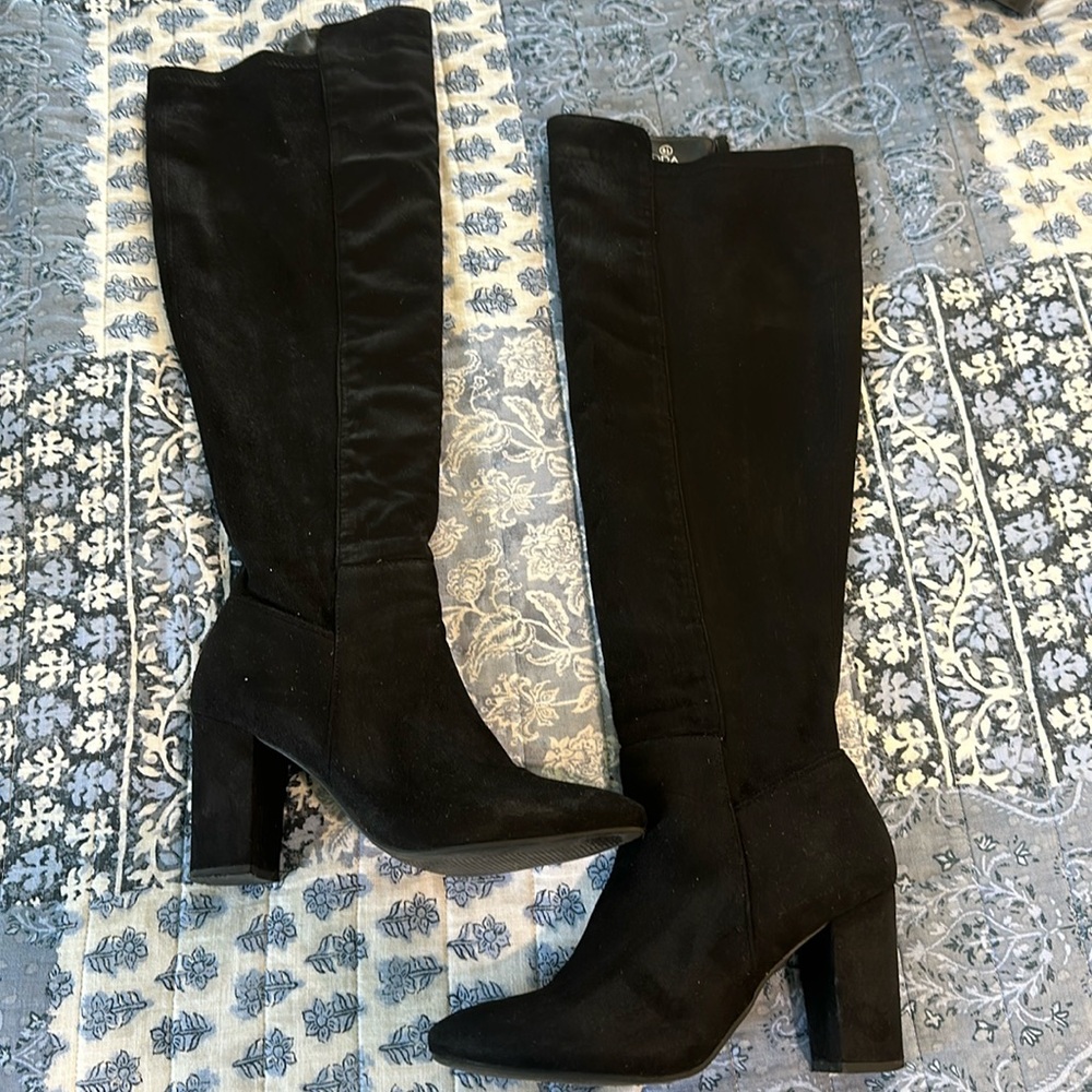 Black heeled over the knee boots
